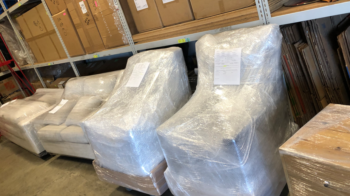 Wrapped furniture stored in the Elmer's Express warehouse